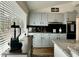 An airy kitchen featuring modern appliances, granite countertops and lovely natural light coming in from a window at 518 Edwin Ct, Roxboro, NC 27573