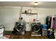 Functional laundry room with modern washer and dryer units and a storage shelf at 518 Edwin Ct, Roxboro, NC 27573