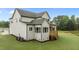 Back exterior shows a home with neutral siding and a wooden deck at 5705 Flowery Meadow Ct, Wake Forest, NC 27587