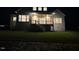 Spacious backyard featuring a covered deck with steps leading down to the well-manicured lawn at 5705 Flowery Meadow Ct, Wake Forest, NC 27587