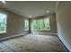 Bright and airy bedroom with large windows providing ample natural light and views at 5705 Flowery Meadow Ct, Wake Forest, NC 27587