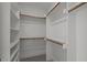 Spacious walk-in closet featuring ample shelving and hanging space at 5705 Flowery Meadow Ct, Wake Forest, NC 27587