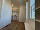 Spacious walk-in closet featuring built-in shelving and a view of the outdoors at 5705 Flowery Meadow Ct, Wake Forest, NC 27587