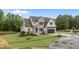 Charming two-story home featuring a modern exterior with well-maintained landscaping at 5705 Flowery Meadow Ct, Wake Forest, NC 27587