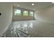 Large living room with bright windows offering lots of natural light at 5705 Flowery Meadow Ct, Wake Forest, NC 27587