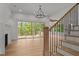 Living room features wood floors, fireplace, with access to back deck at 5705 Flowery Meadow Ct, Wake Forest, NC 27587