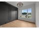 Office space featuring gray accent wall and light-filled window with a view of the outdoors at 5705 Flowery Meadow Ct, Wake Forest, NC 27587