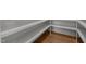 Close-up of open shelving space showing its design, construction, and wood floors at 5705 Flowery Meadow Ct, Wake Forest, NC 27587
