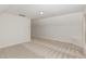 Spacious attic bedroom with neutral carpet, light gray walls, and a dormer window at 58 Atkins Village Ct, Fuquay Varina, NC 27526