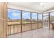 Relaxing screened porch offers great backyard views with lots of space to sit and enjoy time at 58 Atkins Village Ct, Fuquay Varina, NC 27526