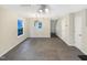 Inviting living room boasting neutral walls, plush carpeting, and ample natural light from a large window at 5803 Osprey Cove Dr, Raleigh, NC 27604
