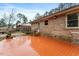 Brick house with a private wood deck and a cozy space for outdoor relaxation and entertainment at 628 Stratford Dr, Zebulon, NC 27597