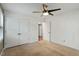 Neutral bedroom featuring carpet, ceiling fan, and closet, offering comfortable and functional living space at 628 Stratford Dr, Zebulon, NC 27597