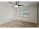 Bedroom featuring a ceiling fan and standard window at 628 Stratford Dr, Zebulon, NC 27597
