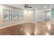 Bright living room with large windows and a view of the surrounding neighborhood at 628 Stratford Dr, Zebulon, NC 27597