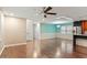 Spacious living area with hardwood floors and an adjacent dining area at 628 Stratford Dr, Zebulon, NC 27597