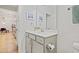 Bathroom featuring gray vanity with a mirror, and tile flooring at 6509 Archwood Ave, Raleigh, NC 27616