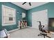 Bedroom with a white bookshelf and a large window at 6509 Archwood Ave, Raleigh, NC 27616