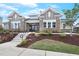 Attractive exterior with stone accents, manicured landscaping, and welcoming entrance at 6509 Archwood Ave, Raleigh, NC 27616