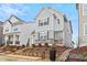 This is a view of the exterior of the house with landscaping, siding and driveway at 6509 Archwood Ave, Raleigh, NC 27616