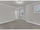 Bedroom with window and neutral walls, provides a calming space for rest and relaxation at 6509 Sunset Manor Dr, Wake Forest, NC 27587