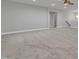 Spacious room with carpet floors perfect for entertaining or relaxing at 6509 Sunset Manor Dr, Wake Forest, NC 27587
