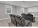 Home theater features comfortable seating, a projector, and a screen for entertainment at 6509 Sunset Manor Dr, Wake Forest, NC 27587