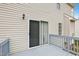 Back deck with railings and sliding door access to the house at 8409 Astwell Ct, Raleigh, NC 27615
