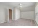 Bedroom with carpet, ceiling fan, closet, and natural light at 8409 Astwell Ct, Raleigh, NC 27615