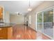 Inviting space with hardwood floors, deck access, adjacent to the kitchen and dining area at 8409 Astwell Ct, Raleigh, NC 27615