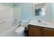 Cozy bathroom featuring vanity with sink, a toilet, and a tub with shower head at 905 Balmoral Dr, Cary, NC 27511