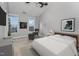 Bedroom with carpet, a ceiling fan, two windows, and a picture on the wall at 9221 Calabria Dr # 116, Raleigh, NC 27617