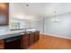 Kitchen sink with wood cabinets and stainless steel appliances at 9221 Calabria Dr # 116, Raleigh, NC 27617