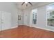 Bright living room features hardwood floors, modern lighting, and neutral wall color at 9221 Calabria Dr # 116, Raleigh, NC 27617