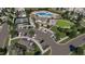 Aerial view of the community amenities, including a pool, tennis courts, parking, and clubhouse at 100 N Stonemill Trl # Homesite 252, Wilson's Mills, NC 27520