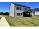 New construction with a spacious backyard featuring a covered patio, perfect for outdoor living and entertaining at 100 N Stonemill Trl # Homesite 252, Wilson's Mills, NC 27520