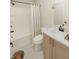 Bright bathroom featuring a shower/tub combination with modern vanity and finishes at 100 N Stonemill Trl # Homesite 252, Wilson's Mills, NC 27520