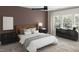 Beautiful bedroom with a warm palette, plush carpet, and large windows that invite the outside in at 100 N Stonemill Trl # Homesite 252, Wilson's Mills, NC 27520