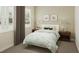 Inviting bedroom with soft lighting, bedside tables, and a comfortable bed, creating a peaceful retreat at 104 N Stonemill Trl # Homesite 253, Clayton, NC 27520