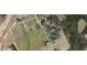 Property lines displayed on an aerial view highlight the location near highways and wooded areas at 1413 Bud Hawkins Rd, Dunn, NC 28334