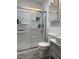 Modern bathroom with a walk-in shower, contemporary vanity, and neutral color scheme at 1413 Bud Hawkins Rd, Dunn, NC 28334