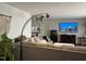 Inviting living room showcasing a modern light fixture and stylish decor at 1413 Bud Hawkins Rd, Dunn, NC 28334