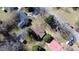 Overhead shot of neighborhood homes with mature trees and landscaping at 1516 Park Ln, Hillsborough, NC 27278
