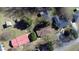 An aerial view of a residential neighborhood showcasing homes and yards at 1516 Park Ln, Hillsborough, NC 27278