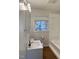 Clean bathroom with tile floor, vanity sink, and shower/tub combination at 1516 Park Ln, Hillsborough, NC 27278
