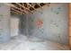 Unfinished basement space with exposed beams and walls provides opportunity for customization and expansion at 1721 Birdhaven Ln, Wendell, NC 27591