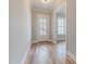 Entryway boasts gleaming hardwood floors and a bright, airy atmosphere at 1721 Birdhaven Ln, Wendell, NC 27591