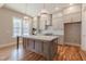 Well-appointed kitchen with a center island, stainless appliances, and ample cabinet space at 1721 Birdhaven Ln, Wendell, NC 27591