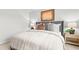 Comfortable main bedroom featuring a plush bed, side tables and decor lighting at 1909 Frost Dr, Haw River, NC 27258