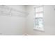 Walk-in closet with wire shelving and a window with natural light at 1910 Frost Dr, Haw River, NC 27258